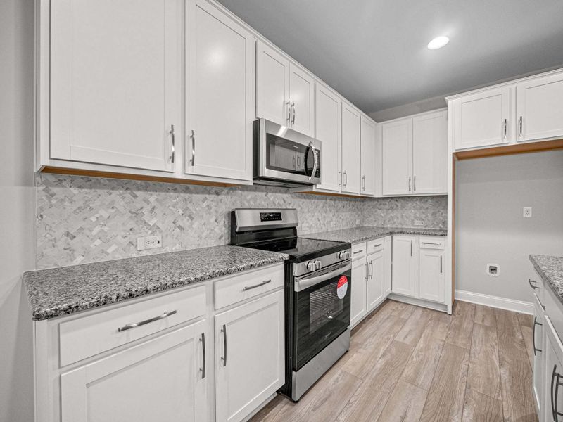 Representative furnished interior of a home built from the Dogwood by Caviness & Cates Communities in Maggie Way, Wendell (Image 156).