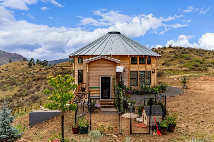 Front exterior of a new home in , Lyons, CO, highlighting curb appeal (Image 30).