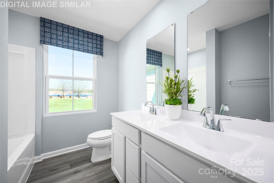 Furnished interior view inside a new home in Bozardt Farms, Charlotte (Image 14).