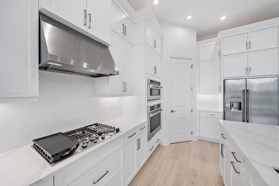 Furnished interior view inside a new home in L'Ambiance at Avenir, Palm Beach Gardens (Image 9).