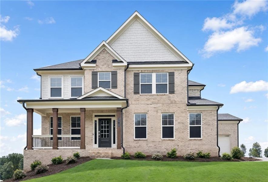 Front exterior of a new home in Estates at Yellow Creek, Cumming, GA, highlighting curb appeal (Image 1). Front exterior of a new home in Estates at Yellow Creek, Cumming, GA, highlighting curb appeal (Image 1).