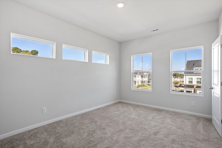 Spacious, unfurnished interior of a new home in Renaissance at White Oak, Garner (Image 20).