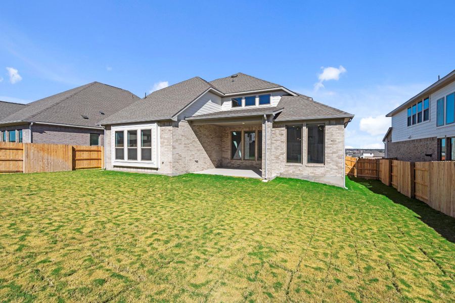 Rear of Home and Private Backyard