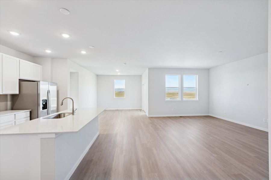 A kitchen with white cabinets. A kitchen with white cabinets.