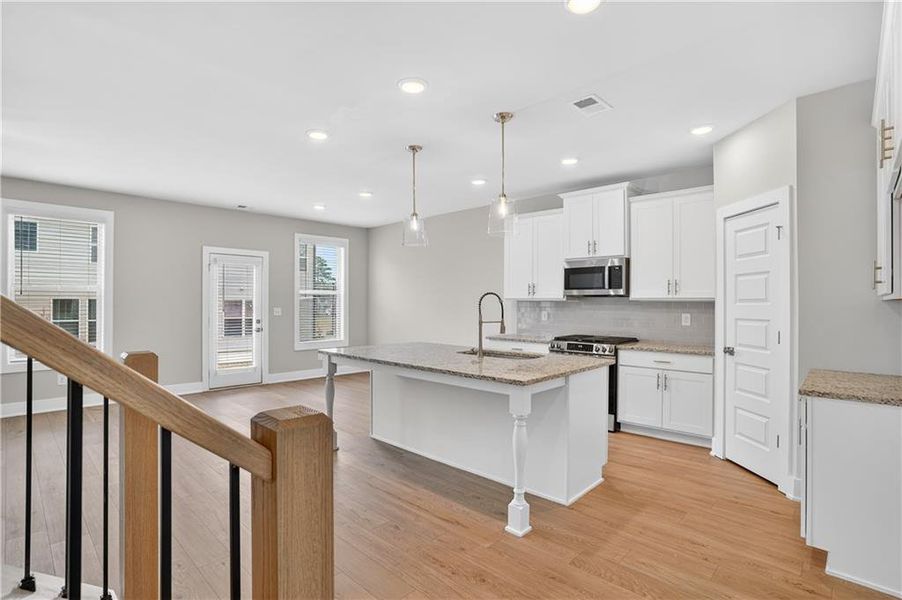 Furnished interior view inside a new home in The Fairways at Mirror Lake, Villa Rica (Image 8).