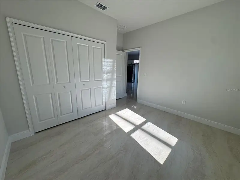 Spacious, unfurnished interior of a new home in , Ocala (Image 9).
