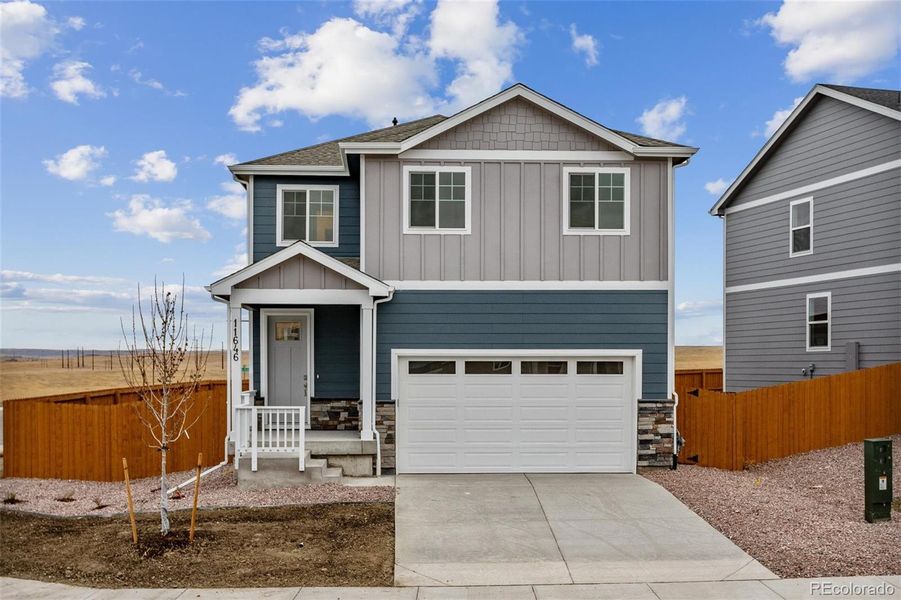 Front exterior of a new home in The Ridge at Lorson Ranch, Colorado Springs, CO, highlighting curb appeal (Image 20).