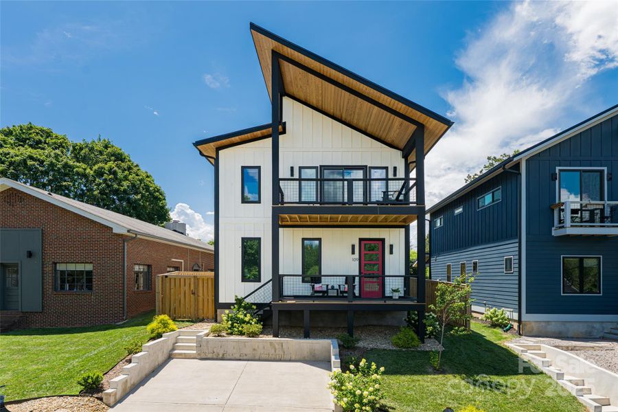 Front exterior of a new home in , Asheville, NC, highlighting curb appeal (Image 1).