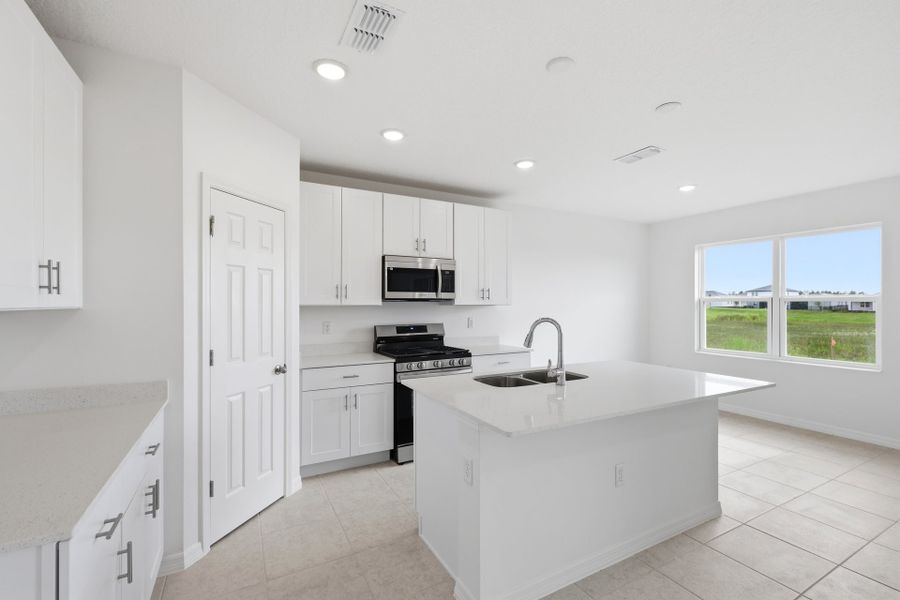 Furnished interior view inside a new home in Highfield at Twisted Oaks, Wildwood (Image 6).