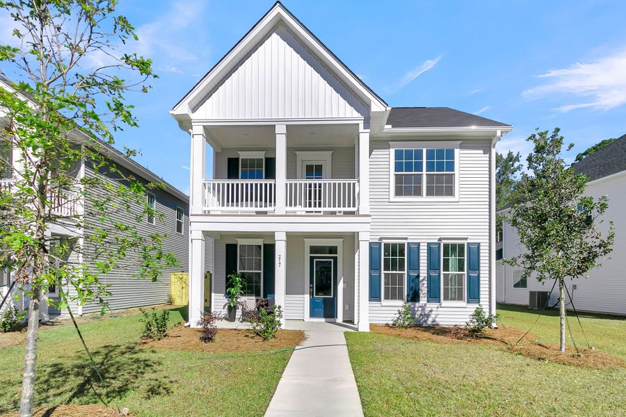 Front exterior of a new home in Six Oaks, Summerville, SC, highlighting curb appeal (Image 25).