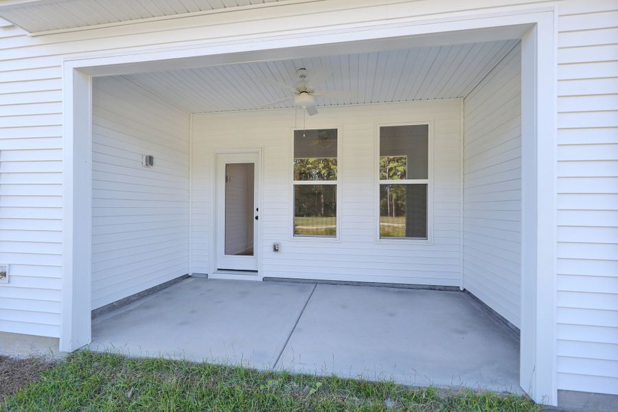 Exterior details and patio area of a home in Bally Castle, Murrells Inlet (Image 20).