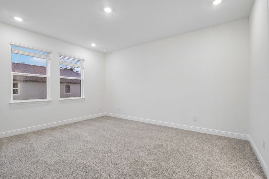 Spacious, unfurnished interior of a new home in Legends Preserve - Signature Series, Daytona Beach (Image 13).