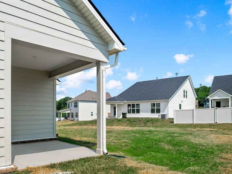 Exterior details and patio area of a home in Woods Crossing, Gallatin (Image 31).