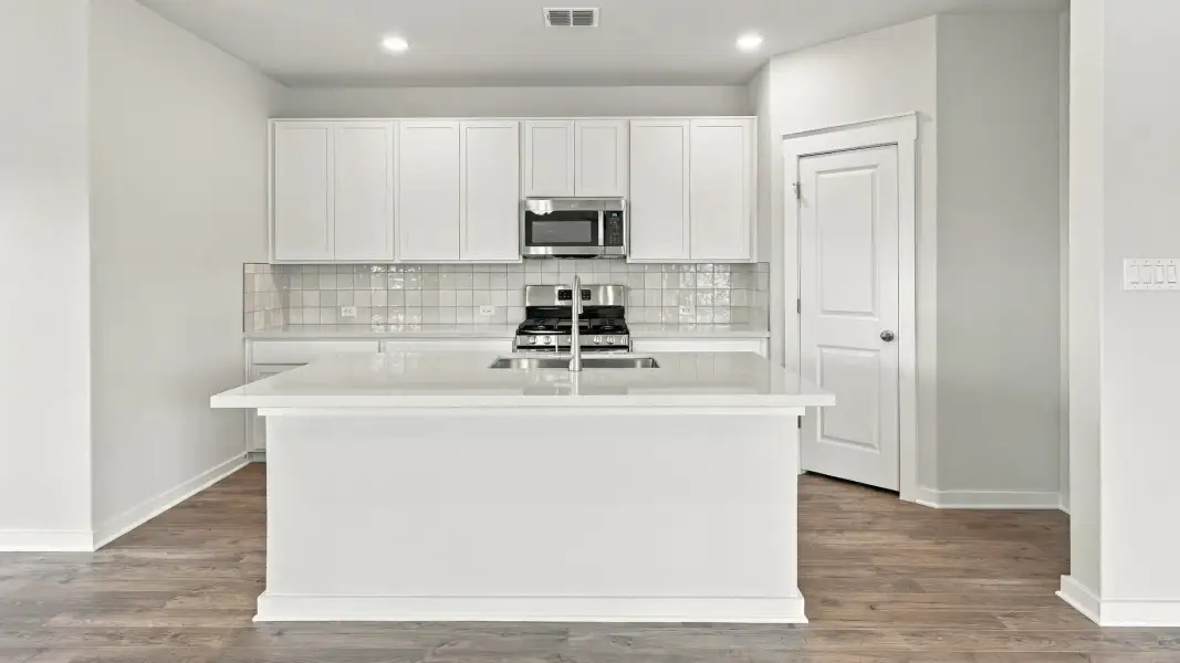 Furnished interior view inside a new home in Carillon, Manor (Image 27).