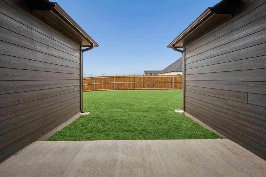 Exterior details and patio area of a home in Hadley Farms, Godley (Image 4).
