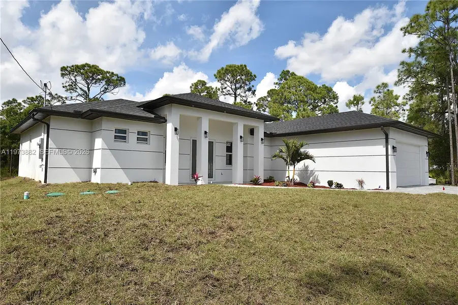 Exterior details and patio area of a home in , Lehigh Acres (Image 3).