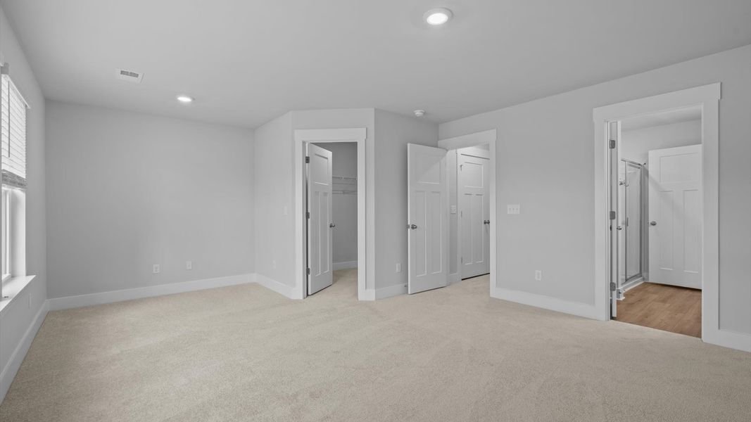 Tasteful primary suite featuring modern finishes and superior comfort near Downtown Spartanburg Tasteful primary suite featuring modern finishes and superior comfort near Downtown Spartanburg