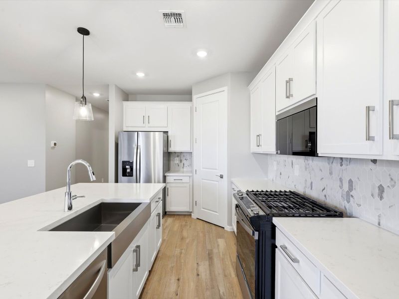 Furnished interior view inside a new home in Silva Farms - Estate Series, Goodyear (Image 3).