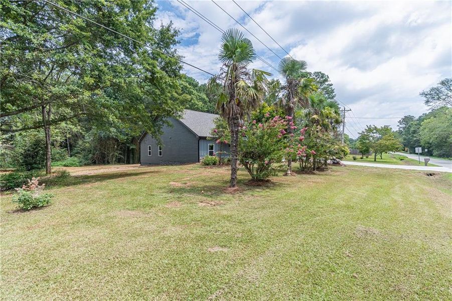 Front exterior of a new home in , Braselton, GA, highlighting curb appeal (Image 2).