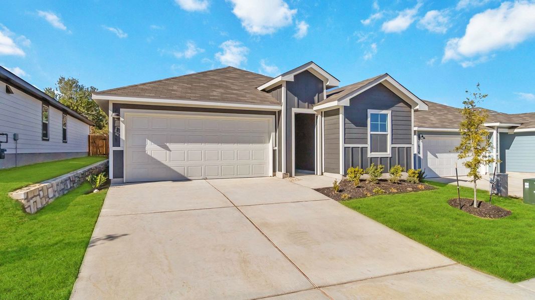 Front exterior of a new home in Wayside, Uhland, TX, highlighting curb appeal (Image 4).