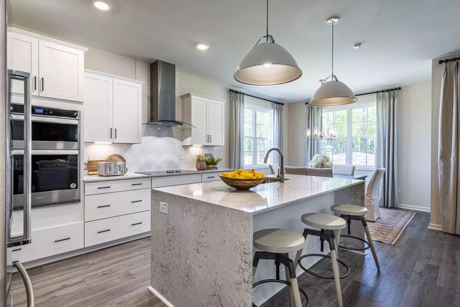 Representative furnished interior of a home built from the Winston by McKee Homes in Alder Creek, Benson (Image 5).