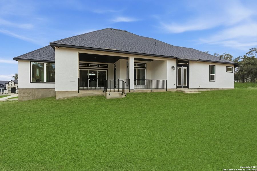 Exterior details and patio area of a home in Heimer Estates at Garden Ridge, San Antonio (Image 30).