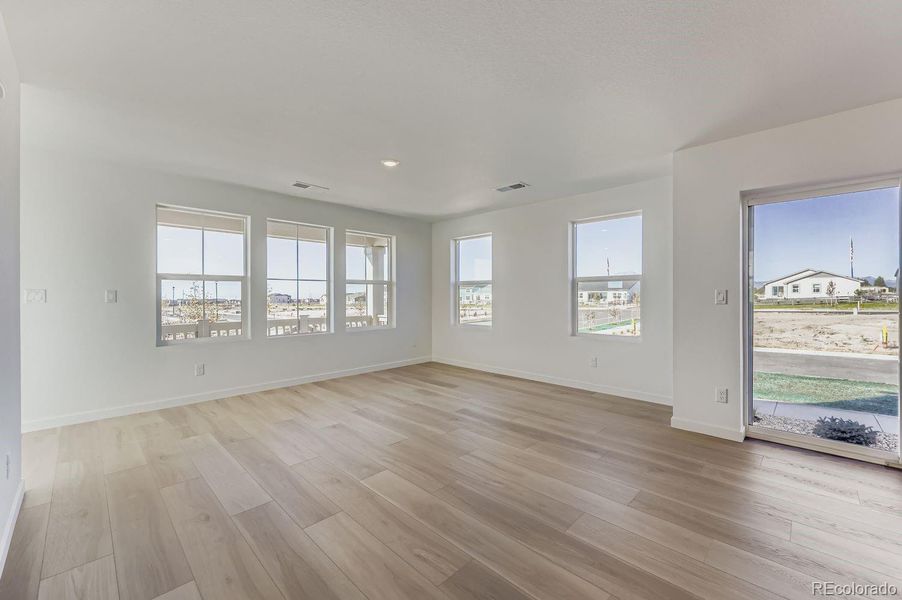Spacious, unfurnished interior of a new home in Percheron: The Explorer Collection, Colorado Springs (Image 10).