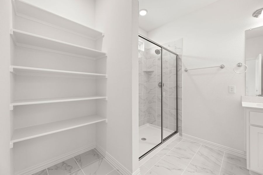 Representative furnished interior of a home built from the Blackburn by UnionMain Homes in Reunion, Rhome (Image 9).