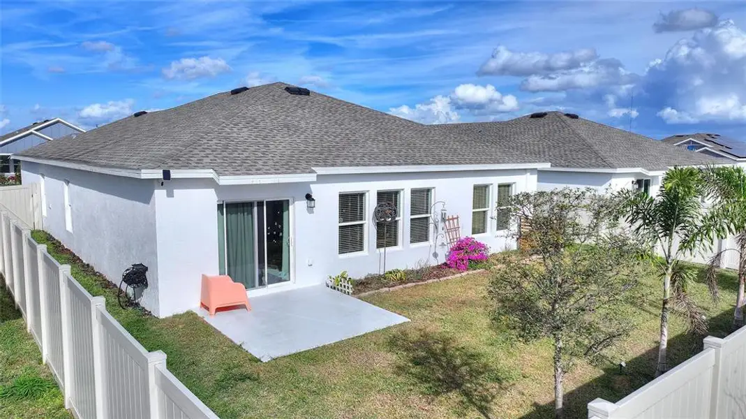 Exterior details and patio area of a home in Lawson Dunes: Estate Collection, Haines City (Image 3).