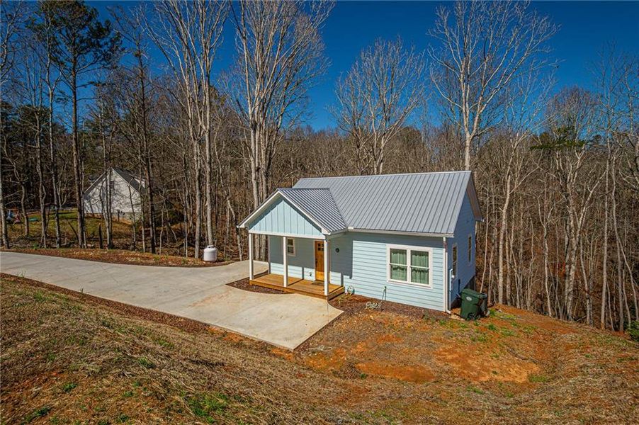 Exterior details and patio area of a home in , Dahlonega (Image 33).