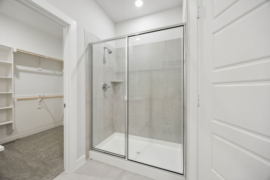 Primary Bathroom in the Birch home plan by Trophy Signature Homes – REPRESENTATIVE PHOTO