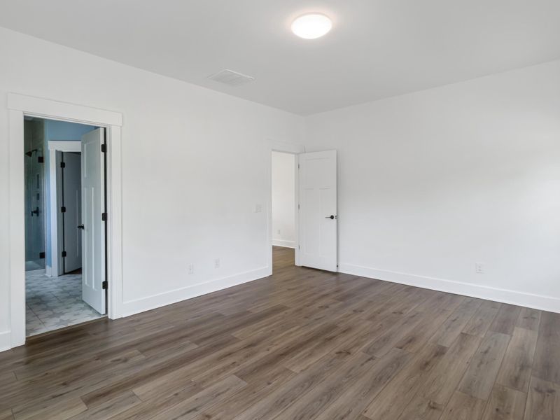 Spacious, unfurnished interior of a new home in Pineland Village, Summerville (Image 28).