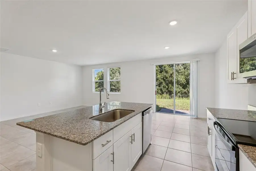 Furnished interior view inside a new home in Bradbury Creek - Signature Series, Haines City (Image 5).