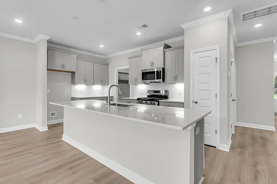 Furnished interior view inside a new home in Pineland Preserve, Summerville (Image 7).