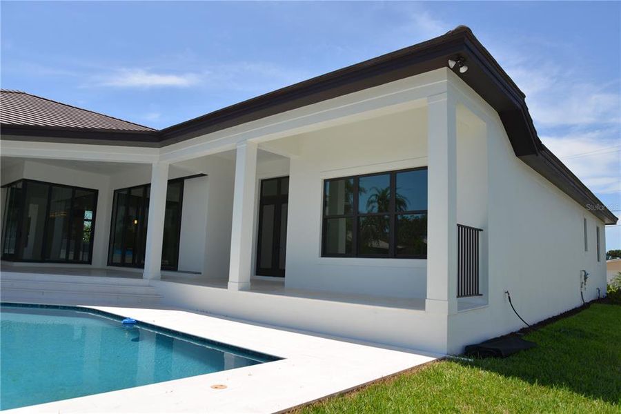 Front exterior of a new home in , Sarasota, FL, highlighting curb appeal (Image 15).