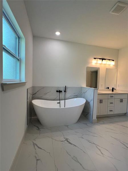 Furnished interior view inside a new home in , Dunnellon (Image 3).