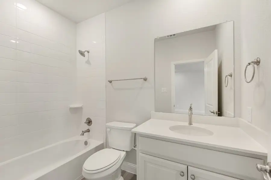 Furnished interior view inside a new home in Cottonwood Creek, Rowlett (Image 34).