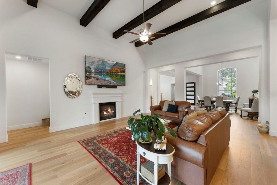 Elegant cedar beams highlight the home’s thoughtful custom design.