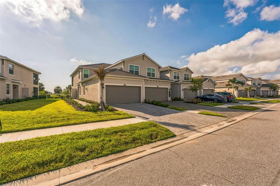 Front exterior of a new home in , Venice, FL, highlighting curb appeal (Image 23).