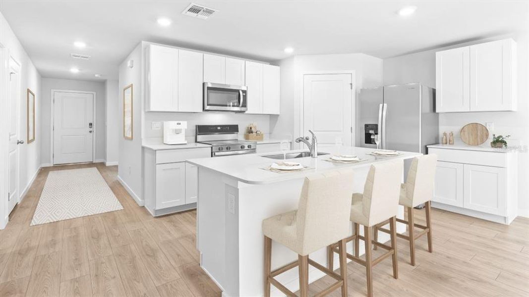 Furnished interior view inside a new home in Driftwood Bay, Port Charlotte (Image 5).