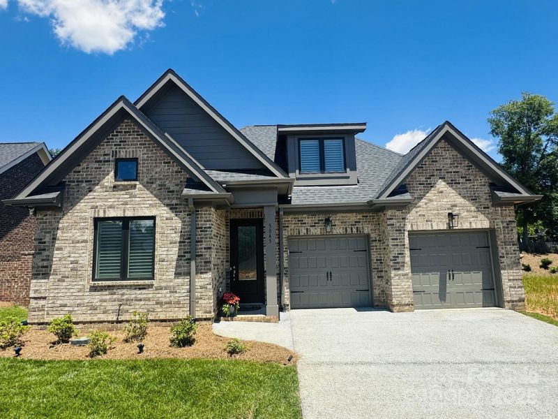Front exterior of a new home in , Denver, NC, highlighting curb appeal (Image 1).