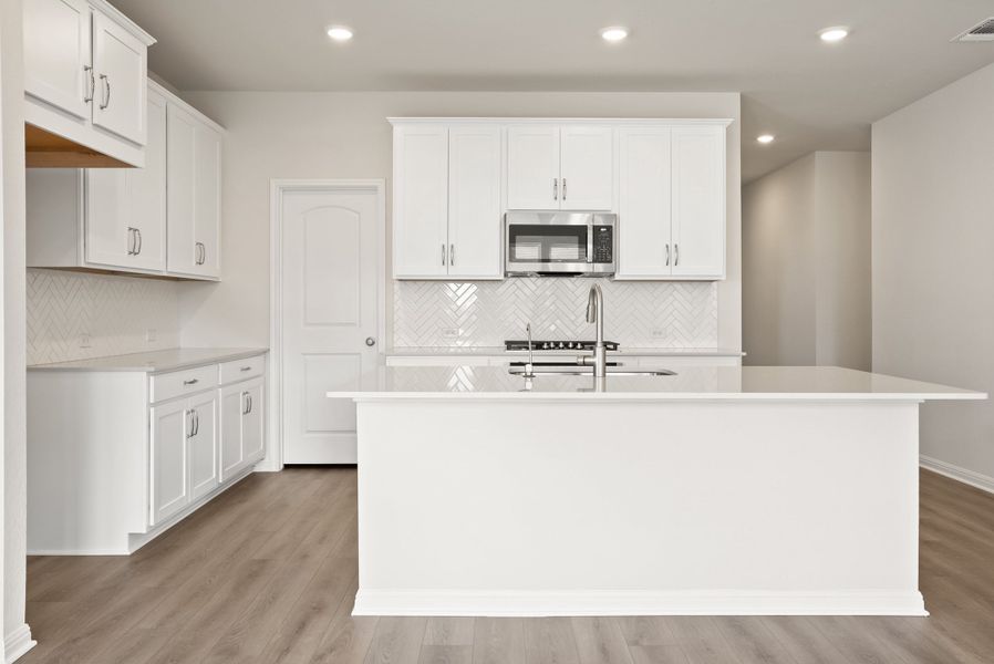 Representative furnished interior of a home built from the Somerville by Ashton Woods in Willow Springs, Buda (Image 11).