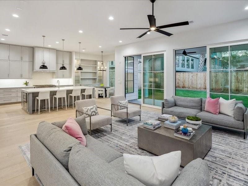 View of Living room to open Kitchen