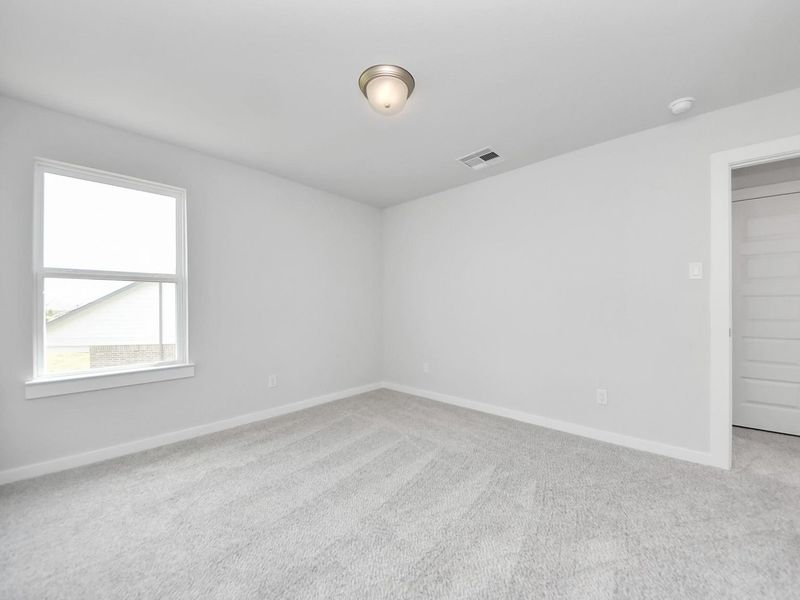 Spacious, unfurnished interior of a new home in Sunterra, Katy (Image 29).