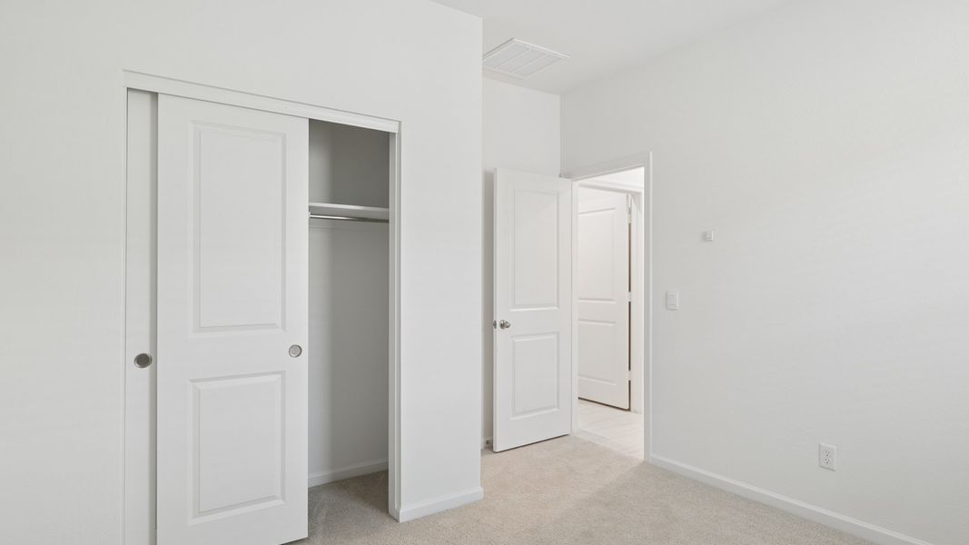 Spacious, unfurnished interior of a new home in Copper Falls, Buckeye (Image 16).