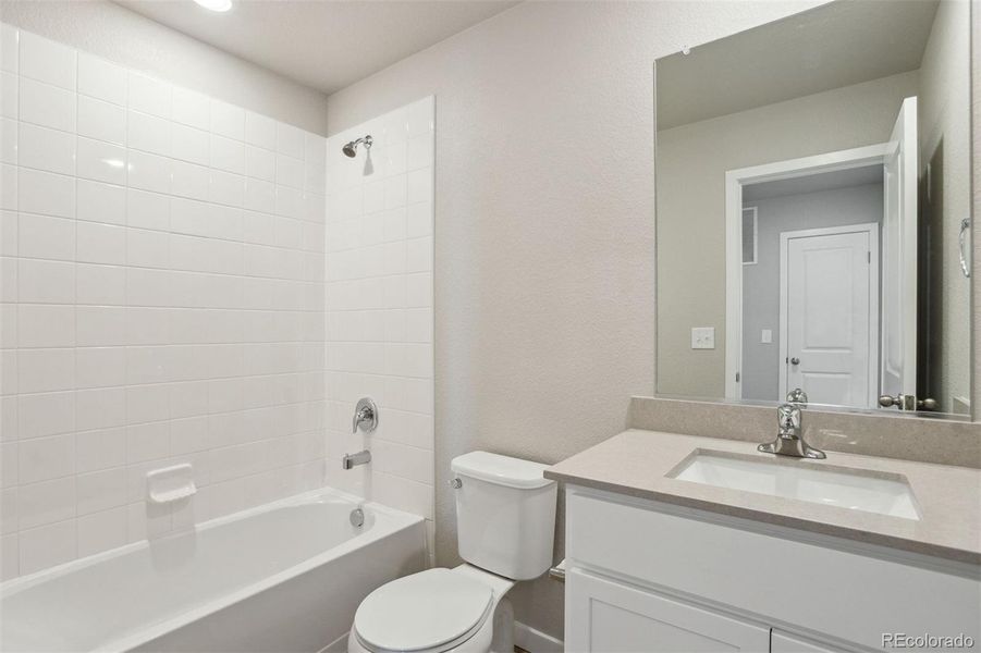 Furnished interior view inside a new home in Bennett Ranch, Bennett (Image 3).
