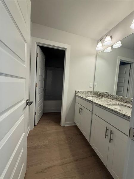 Furnished interior view inside a new home in The Fairways at Mirror Lake, Villa Rica (Image 9).