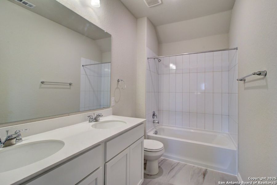 Furnished interior view inside a new home in Casinas at Gruene, New Braunfels (Image 7).