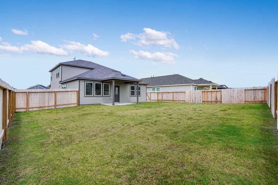 Front exterior of a new home in Redbud 45s, Hockley, TX, highlighting curb appeal (Image 2).