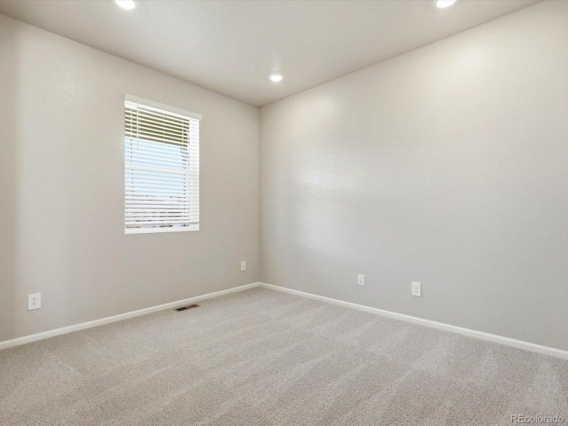 Spacious, unfurnished interior of a new home in Buffalo Highlands: The Flora Collection, Commerce City (Image 17).